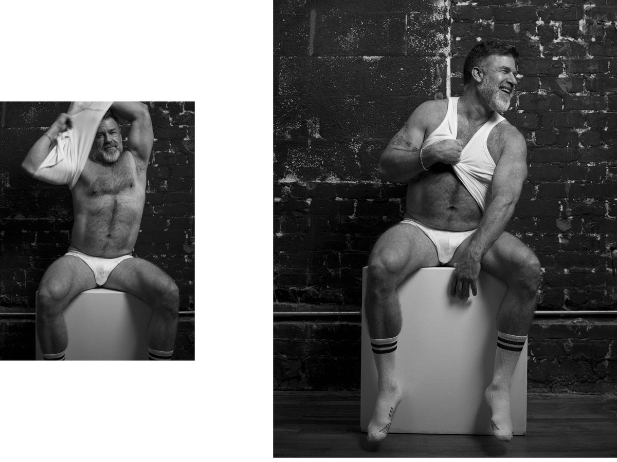 Spread 4 of 8: two photographs of a bearded, grey-haired man in briefs, removing a tank top and seated on a block; black and white.